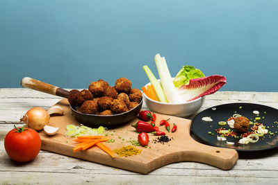 Fruits and vegetables on cutting board