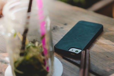 Close-up of smart phone on table