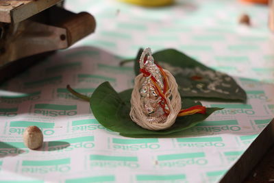 Lord ganesha idol upon paan 