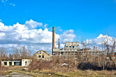 Abandoned building against sky