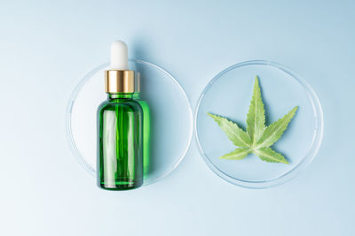 Cannabis face beauty serum or oil dropper concept. natural cosmetic. cbd oil, thc tincture and hemp