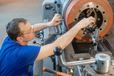 Man repairing machinery