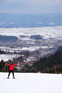 Scenic view of snow covered landscape against sky