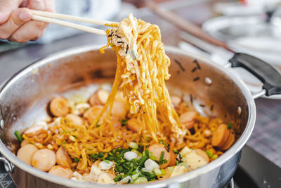 Close-up of person preparing food