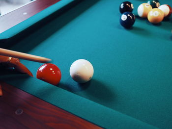 Multi colored balls on pool table