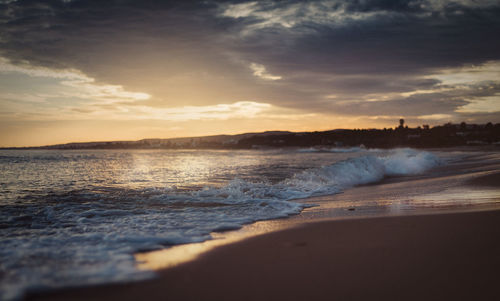 Scenic view of sea against sky during sunset