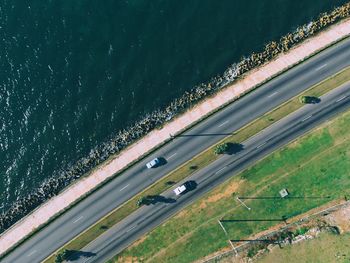 High angle view of road by sea