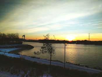 Scenic view of sea at sunset