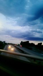 Road passing through car windshield