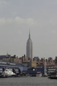 Modern buildings in city against sky