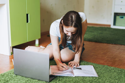 Young woman using mobile phone