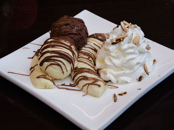 High angle view of cake in plate on table