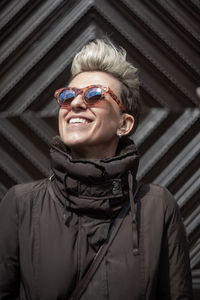 Portrait of smiling man wearing sunglasses