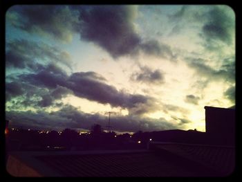 Built structure against cloudy sky