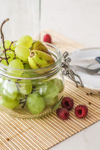 Close-up of fruits in jar