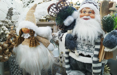 Close-up of stuffed toy on snow during winter