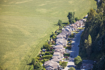 Urban development on the edge of a farm field