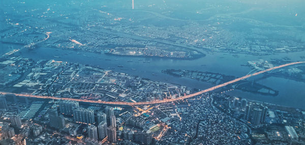 High angle view of illuminated city buildings