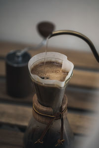 Close-up of coffee cup on table