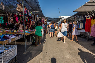 People walking on street market