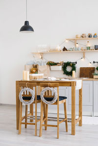 New year and christmas. festive scandinavian cuisine in christmas decorations. candles