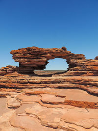 Rock formation against blue sky