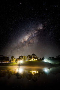 Scenic view of lake against star field