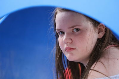 Close-up portrait of a girl looking away