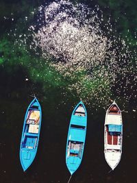 High angle view of boats in sea during sunny day