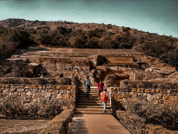 Group of people on the wall