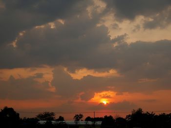 Scenic view of dramatic sky during sunset