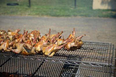 Chicken cooking on barbecue grill