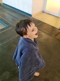 Boy wearing hat at home