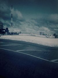 Road against cloudy sky