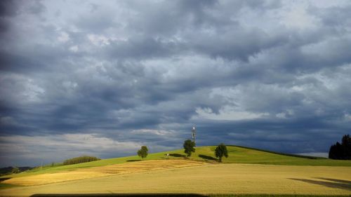 Scenic view of land against sky