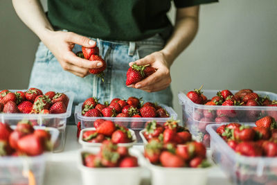 Midsection of man preparing food