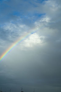 Low angle view of rainbow against sky