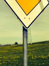 Close-up of agricultural field against sky