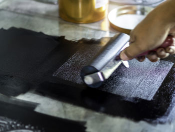 High angle view of person working on table