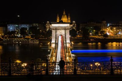 Scenic view of illuminated szechenyi chain bridge over river at night