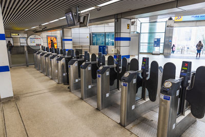 Ticket barriers at train station entrance for passenger access control. london, uk, 17 march 2024