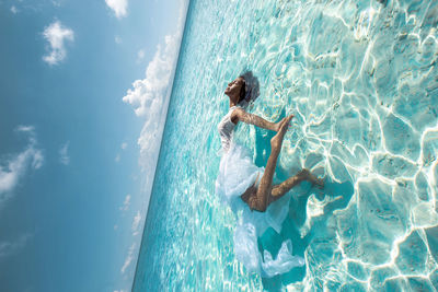 Man swimming in pool