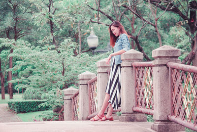 Woman sitting in park