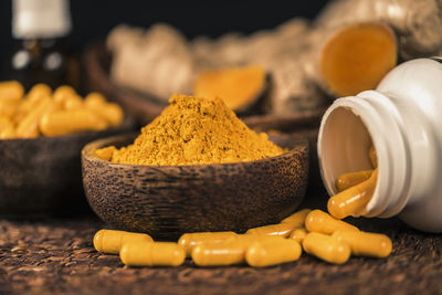 Close-up of yellow eggs on table