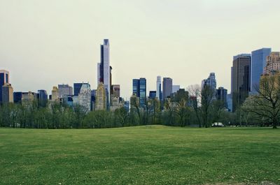View of modern buildings in city against sky
