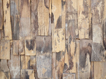 Full frame shot of weathered wooden wall