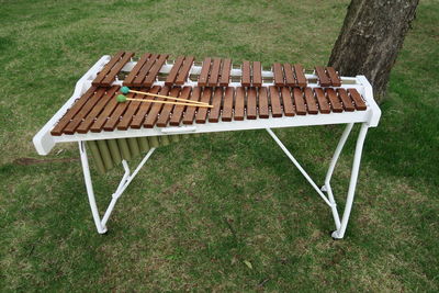 High angle view of bench in park