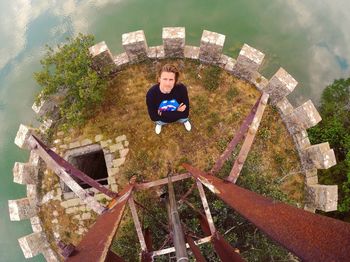 Rear view of a smiling young woman outdoors
