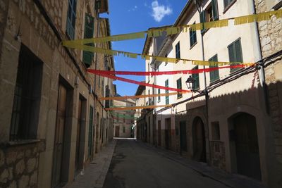 Street amidst residential buildings