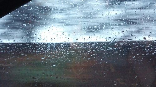 Close-up of water drops on glass